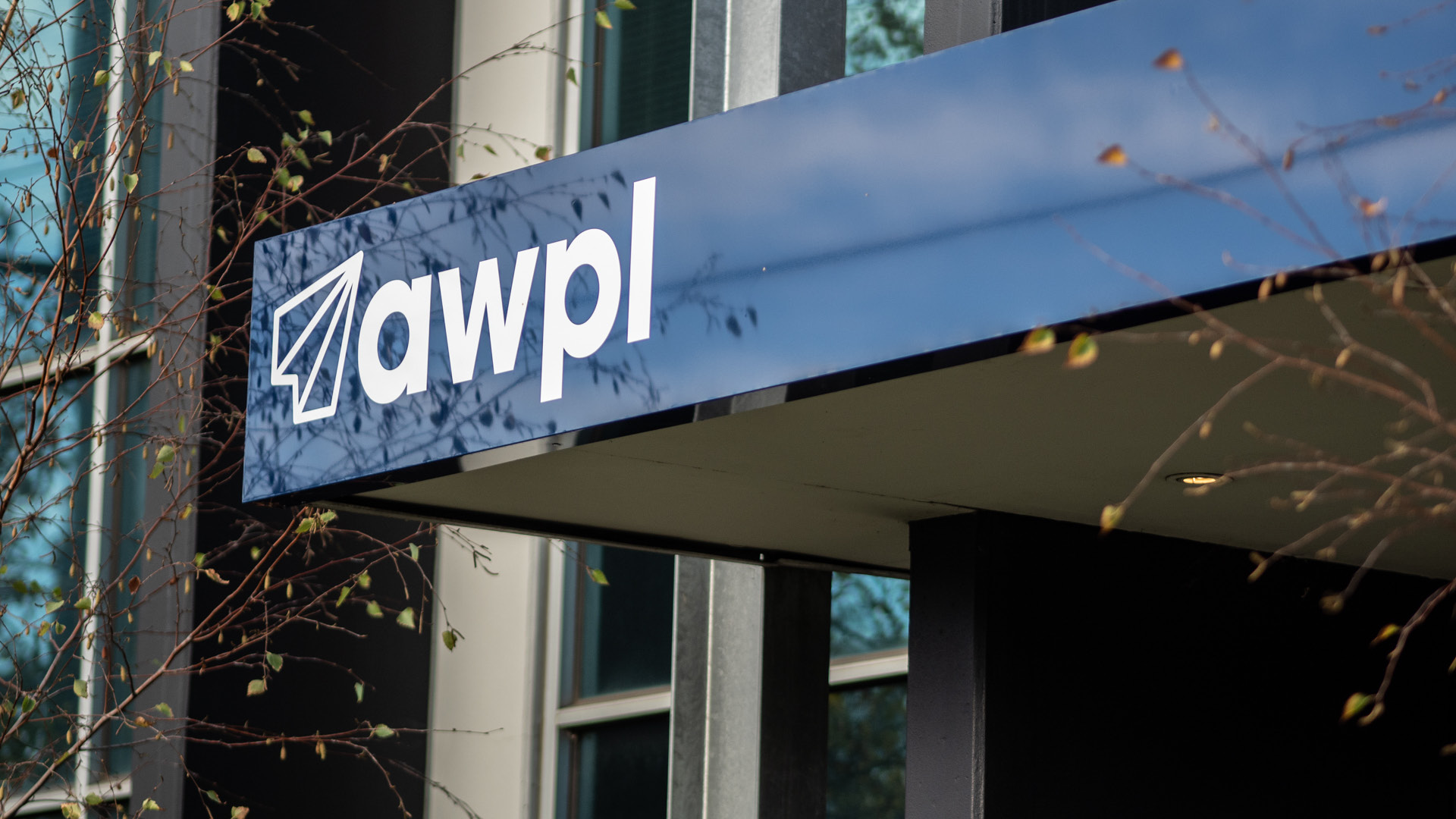 awpl logo in white on blue bulkhead